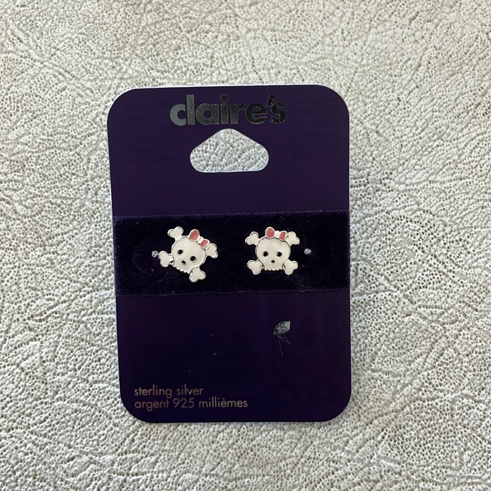 Claire’s sterling silver skull earrings